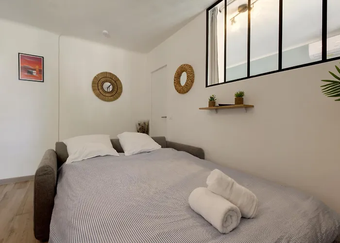 016- T2 Tropisme, 1 Chambre,clim,wifi,parking